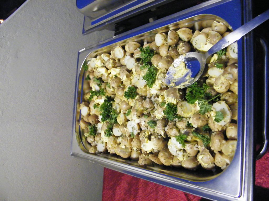 Roasted garlic baby potatoes, a classic side dish for Argentinian spitbraai catering in Gqeberha(Port Elizabeth) and Kariega by Pedros Asado.