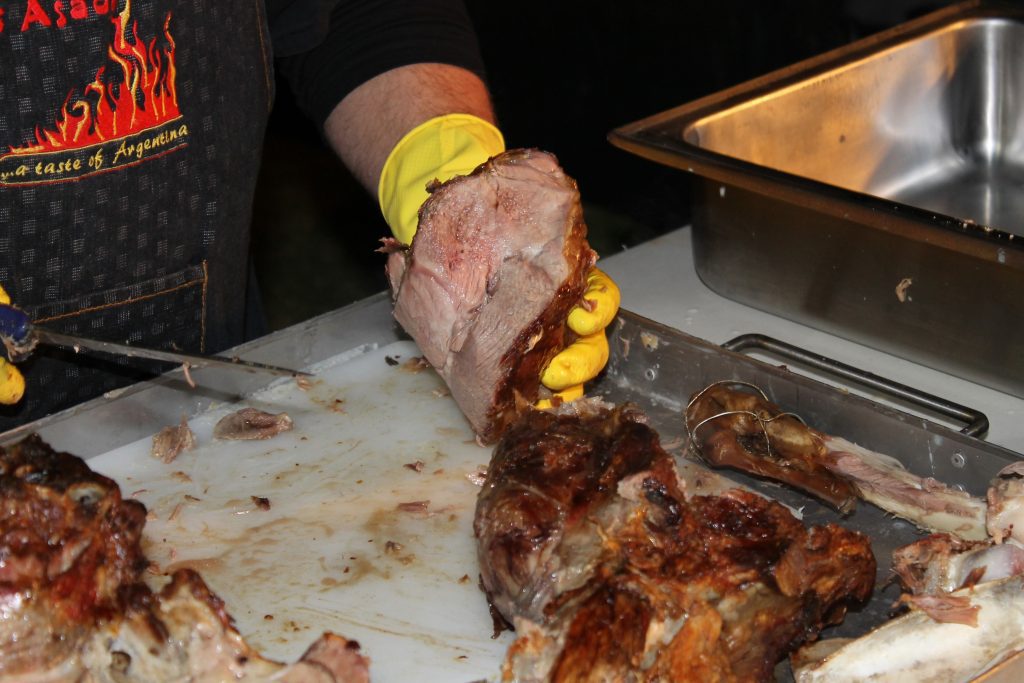 Succulent sliced spitbraai lamb prepared on-site for a private function in Kariega.