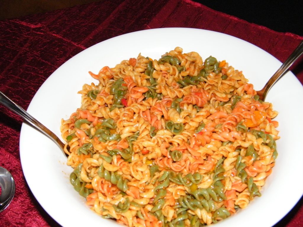Traditional South African curry noodle salad, a flavorful side dish for spitbraai catering in Gqeberha and Kariega by Pedros Asado.