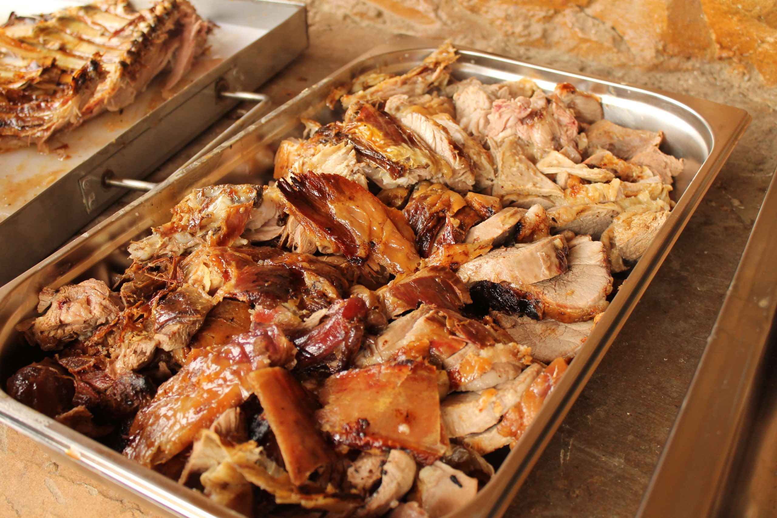 Carved spit-braaied lamb sliced and ready to serve at a Pedros Asado catering event